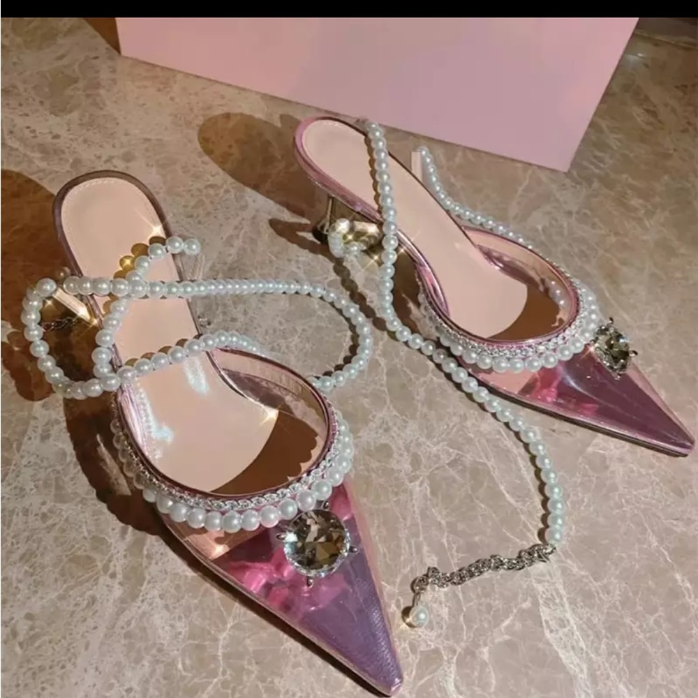 Beautiful Designer inspired heels color pink pvc.